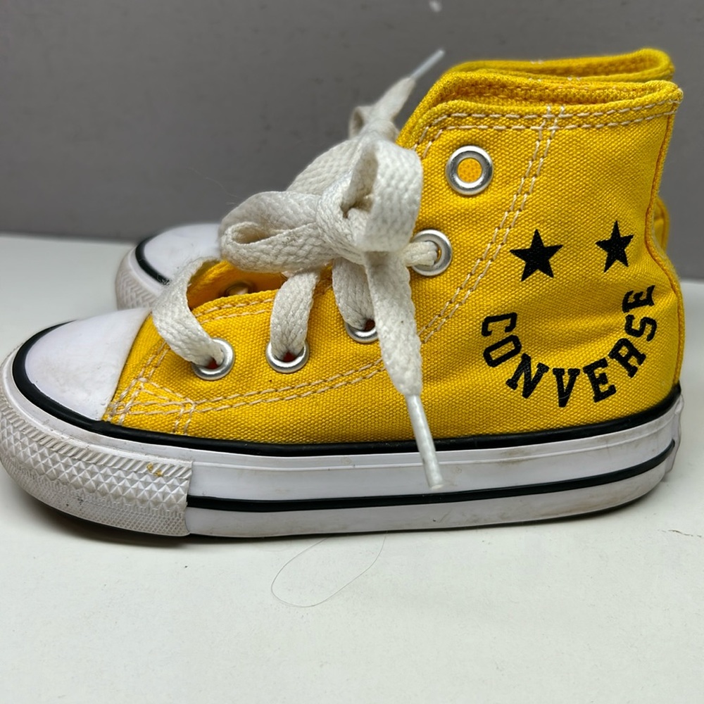 Converse yellow happy face high tops